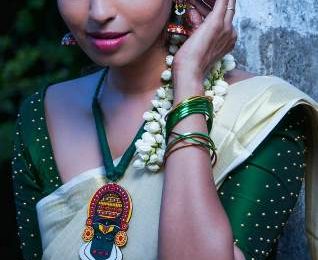 Gorgeous actress Kuhasini Gnanaseggaran Onam Photoshoot