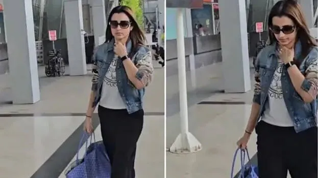 Trisha avoids answering questions about Vijay in 1st appearance at airport